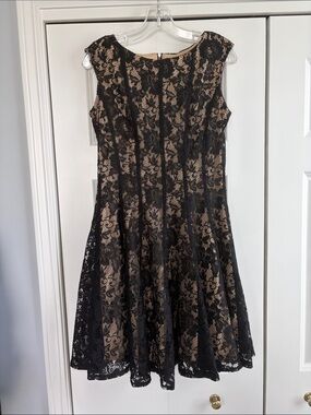 Danny and Nicole Sleeveless Black Lace Overlay Dress with Nude Lining. 10